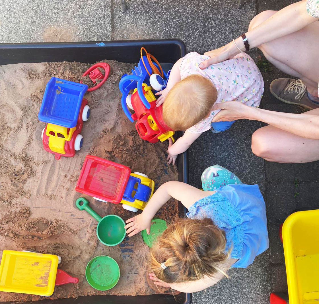 children playing in a sandpit
